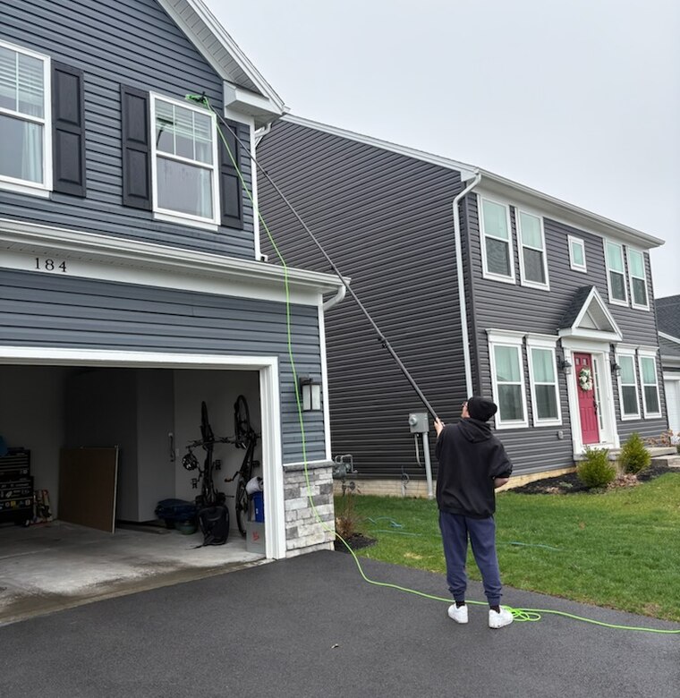 Window cleaning in a residential neighborhood